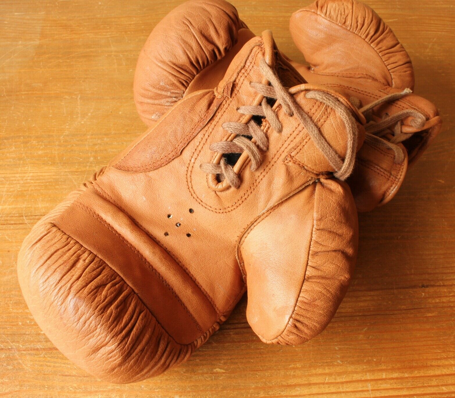 Light Brown Leather Straw Filled Boxing Gloves. c1930's.