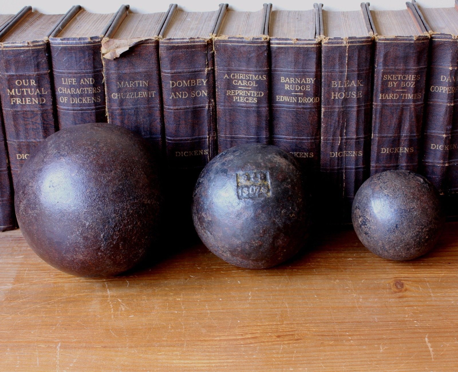 Three Cast Iron Shot Puts. 16, 8 & 4 lbs Balls.