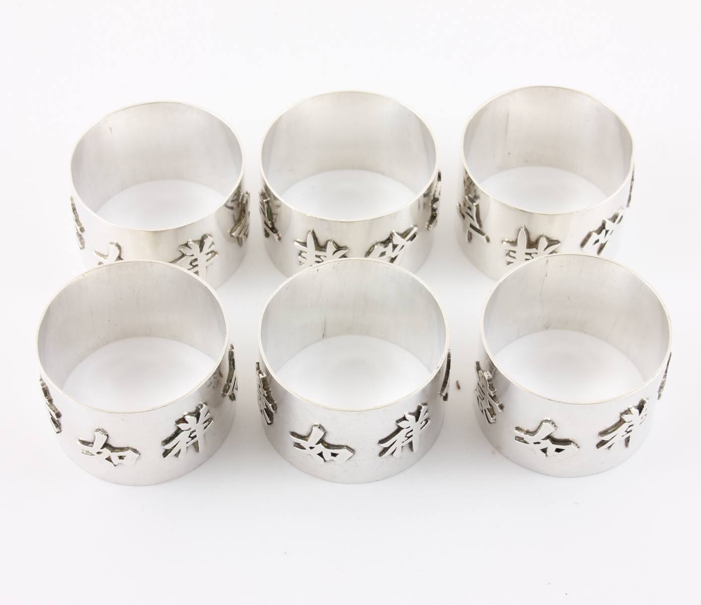 Six Chinese Silver Napkin Rings With Chinese Symbols. Wang Hing c1890.